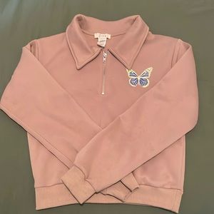 Super cute pullover zipup with vintage graphics!